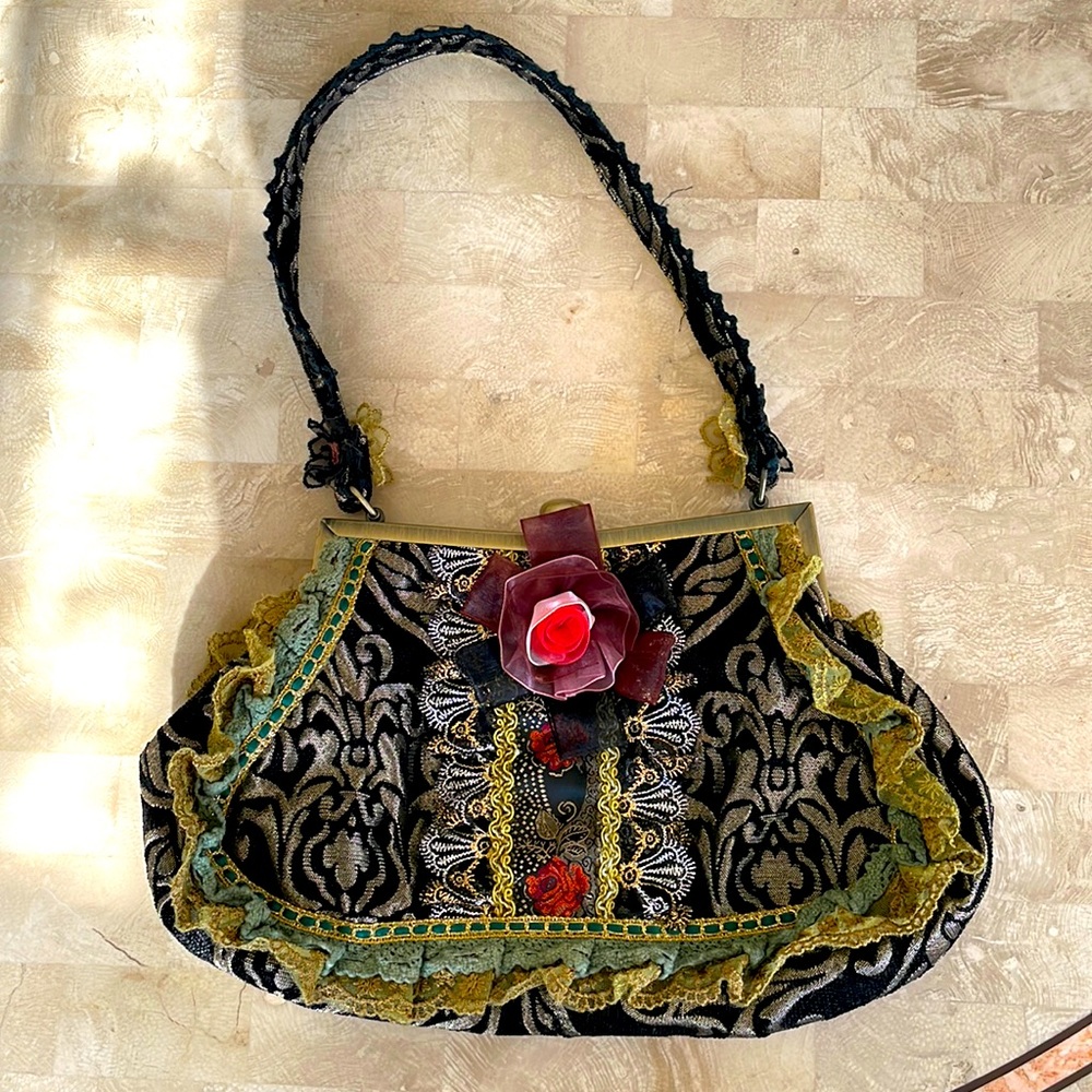 Blinged out purse! tons of detail in this one of a kind bag! New without tags.